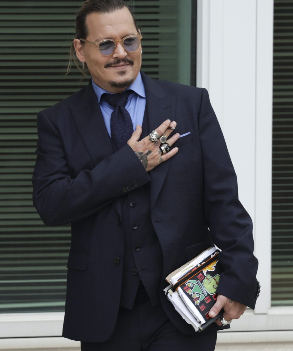 FAIRFAX, VIRGINIA - MAY 27: Actor Johnny Depp takes a break during his trial at a Fairfax County Courthouse on May 27, 2022 in Fairfax, Virginia. Closing arguments in the Depp v. Heard defamation trial, brought by Johnny Depp against his ex-wife Amber Heard, begins today. (Photo by Kevin Dietsch/Getty Images)