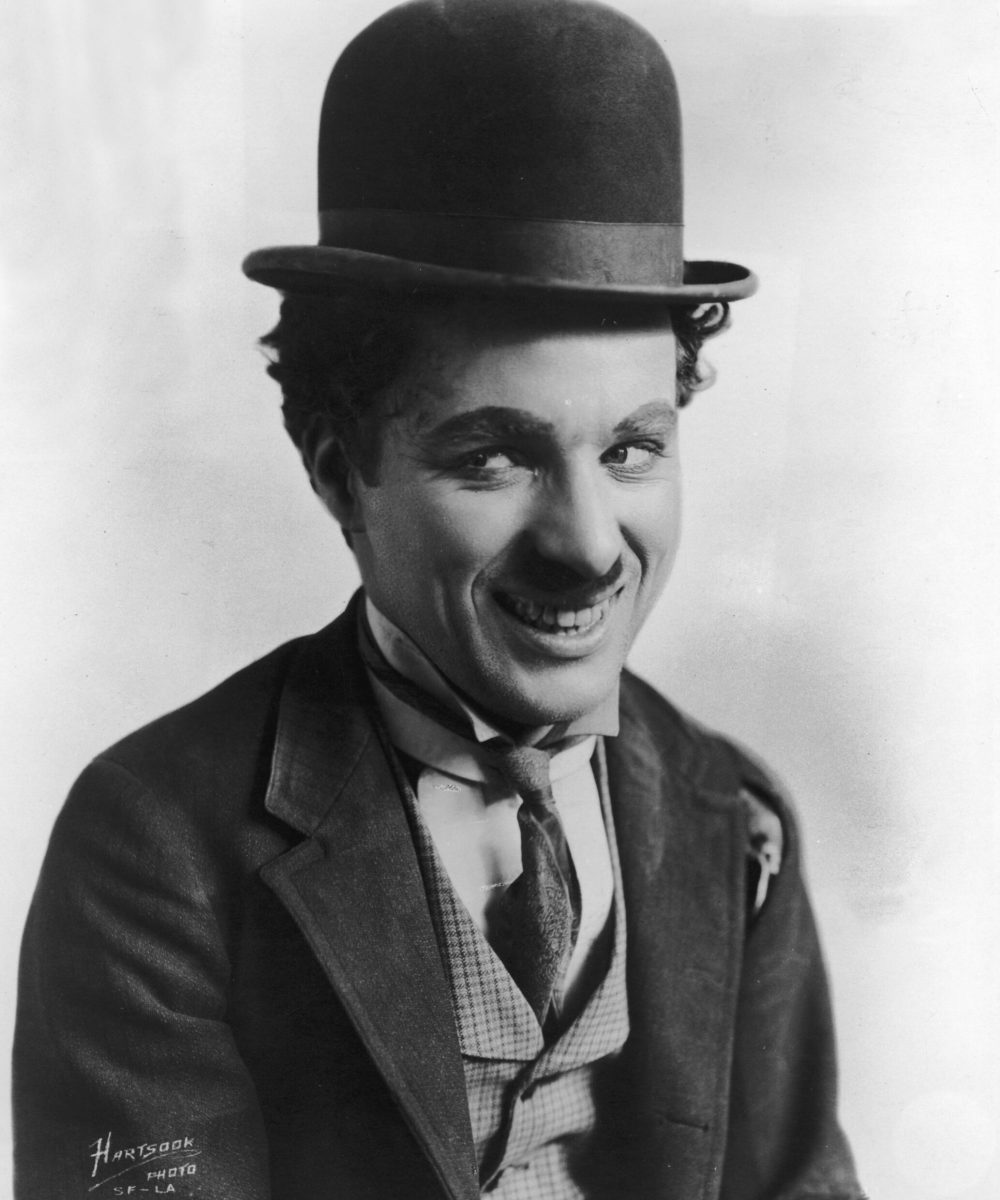 circa 1925:  British comic actor and film director Charles Chaplin (1889 - 1977) in character as the Little Tramp.  (Photo by Hulton Archive/Getty Images)