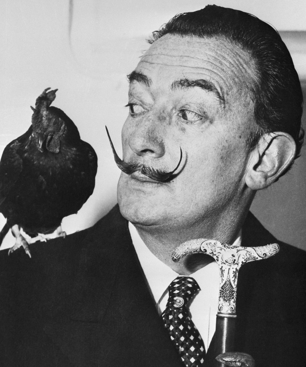 Artist Salvador Dali arrives in New York with a rooster named Oscar, whose acquaintance he made on his trip